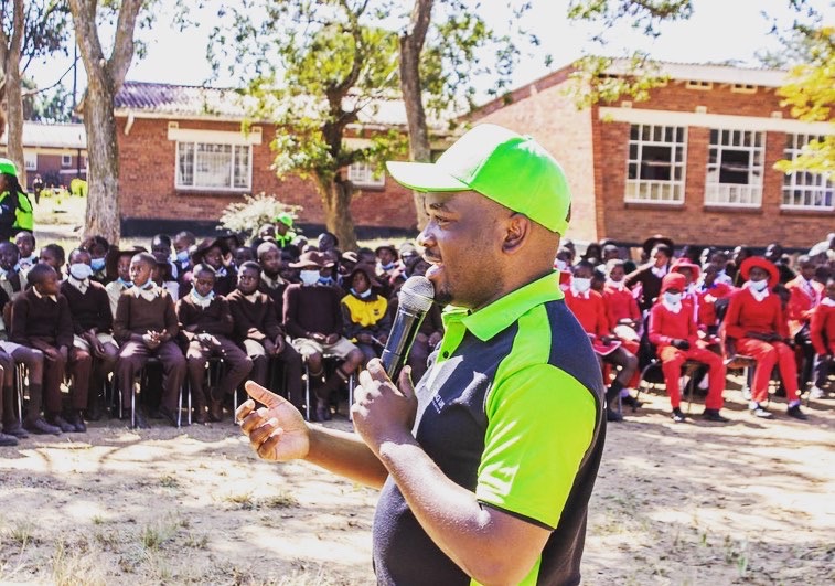 Brian speaking to students during a Grace Life Foundation programme